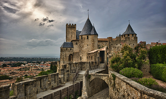 Visit Carcassonne, a fortified town in the South of France